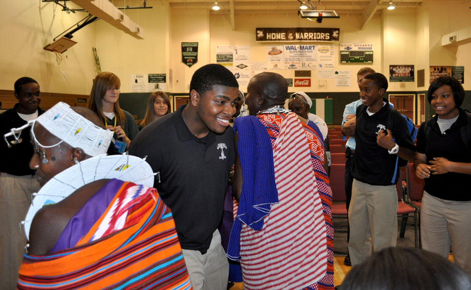 A couple American students getting Maasai dance lessons