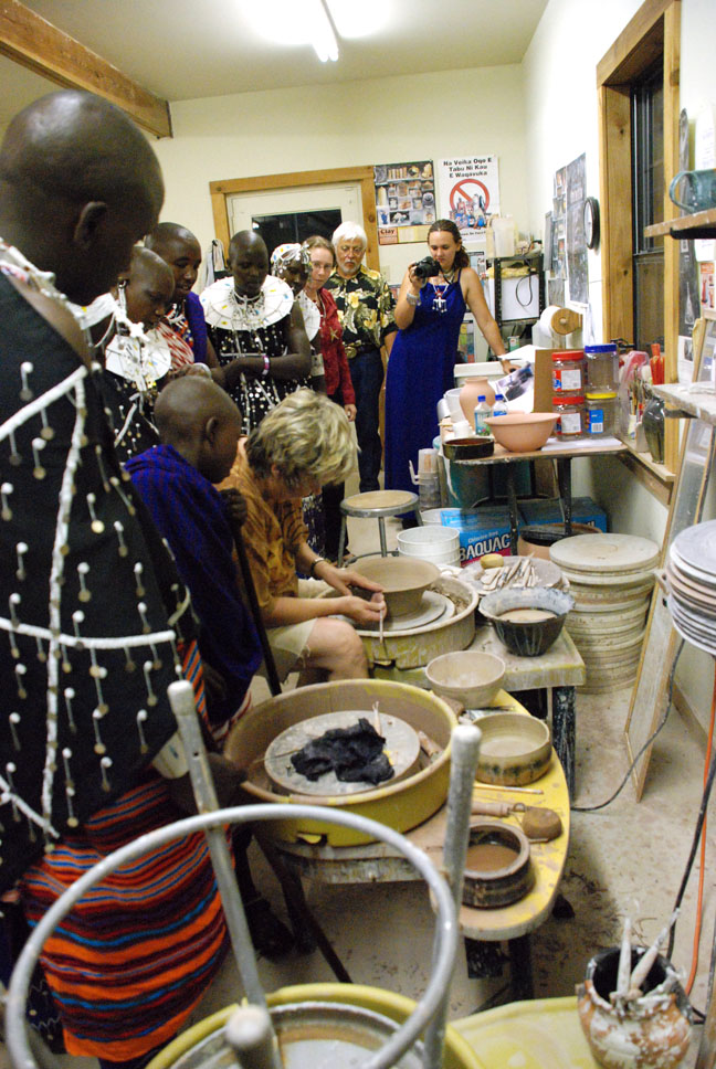 Mary shows the Maasai how to make a pot