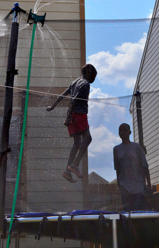 Mathayo and Sifa experienced a new addition to the Trampoline experience: sprinkler!