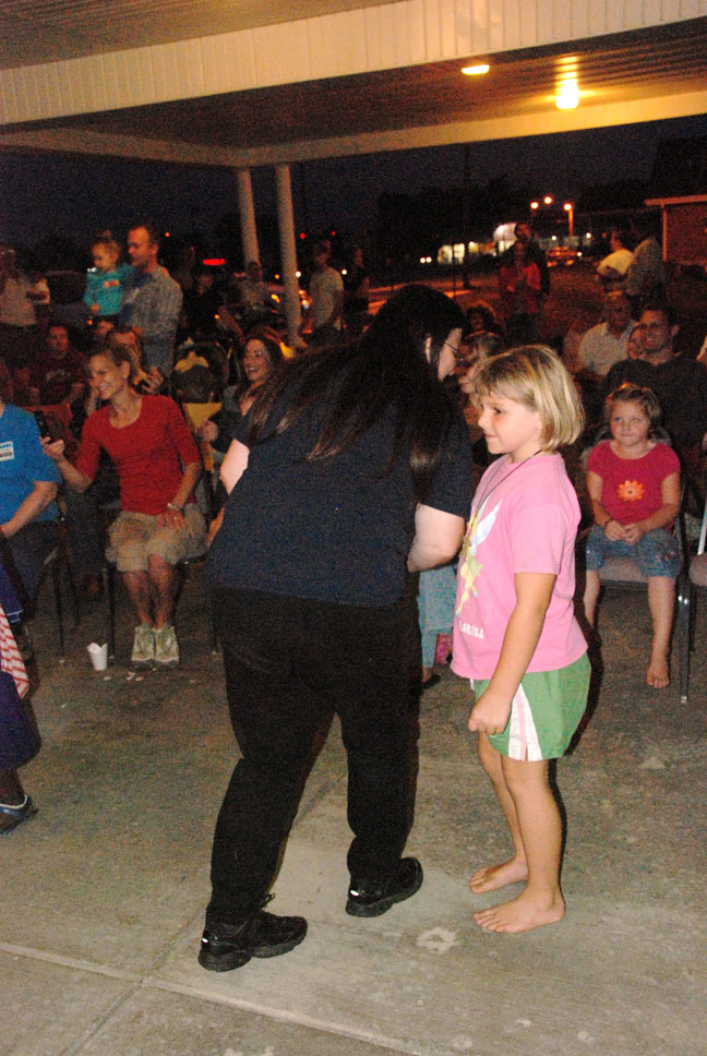women and girl dancing